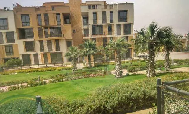 شقة دور ارضى للبيع فى كمبوند سوديك ويست الشيخ زايد مساحة  المبانى: 178 متر و  مساحة الحديقة: 54 متر