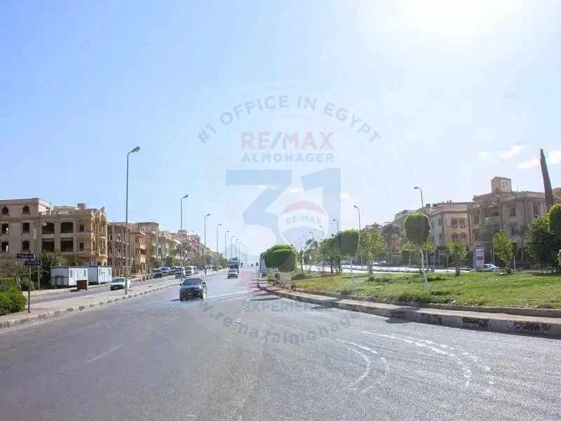 Mall plot of land for sale directly on Sadat Axis, Al-Yasmine