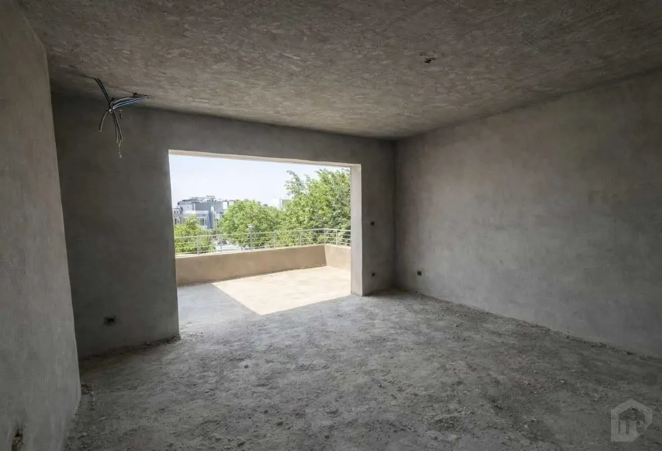 English: Interior View of a Room Under Construction Opening to a Terrace