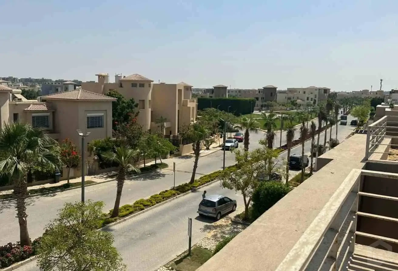 Panoramic High-Angle View of the Street, Open Spaces, and Lake