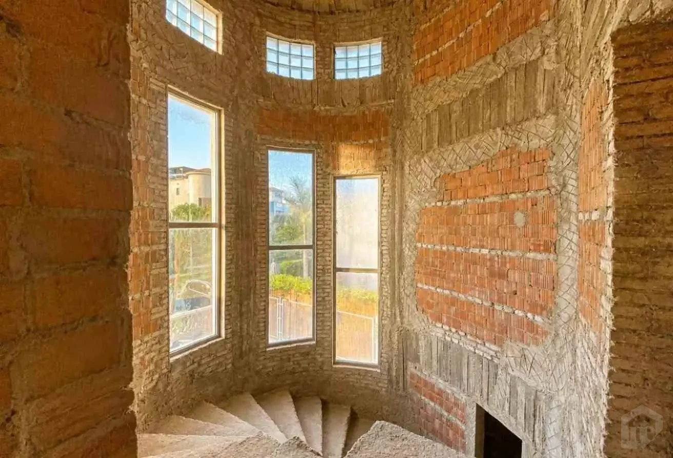 Semi-Finished Spiral Staircase Area with Natural Light Openings
