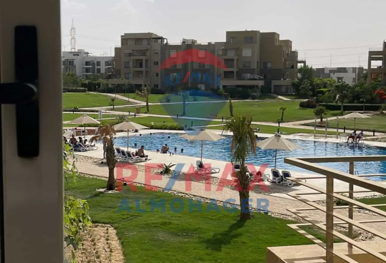 Own a Dual-View Apartment in Palm Parks – Pool & Landscape
