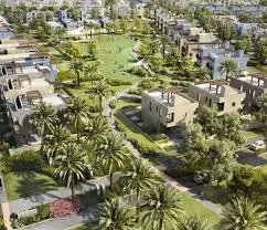 شقة أرضي بحديقة للبيع في كمبوند او ويست