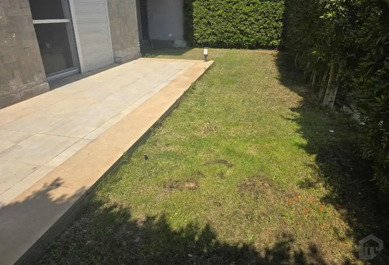 استمتع بالهدوء: شقة أرضي بحديقة على البحيرة في نيو جيزة