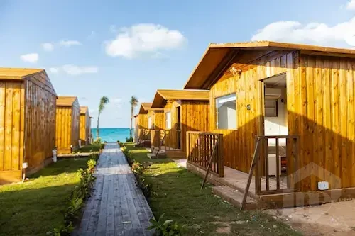 Operational Hotel Resort with Chalets, Restaurants, and Private Beach