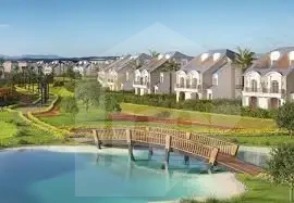 Twin house with pool for sale in Mivida