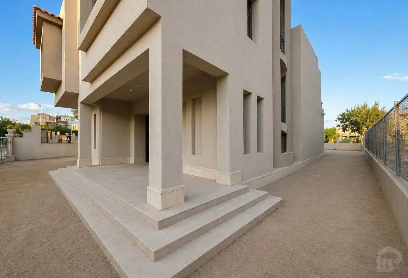 Another Angle of the Rear Entrance Showing Exterior Staircase and Railing