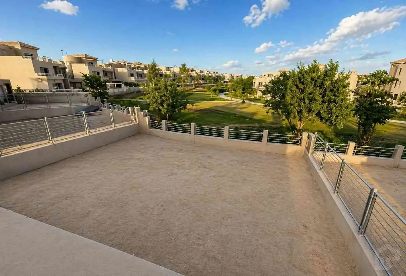 Rear Shot from the Villa Showing the Spacious Garden and Surrounding Residential Complex